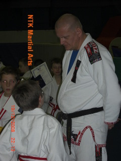 Sensei Alan listening intently.