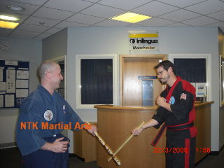 Sensei Andy learning to go with the flow with Sensei Mike Matthews.