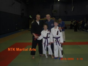 Master Toni Kauhenan, Sensei Andy with junior students Henry & Dan.